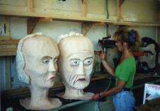 The Giant Heads being painted